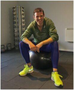 Lawrence Harvey, co author of Triple Jump Trailblazers, resting at the gym